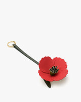 Leather flower keychain with ring attachment.