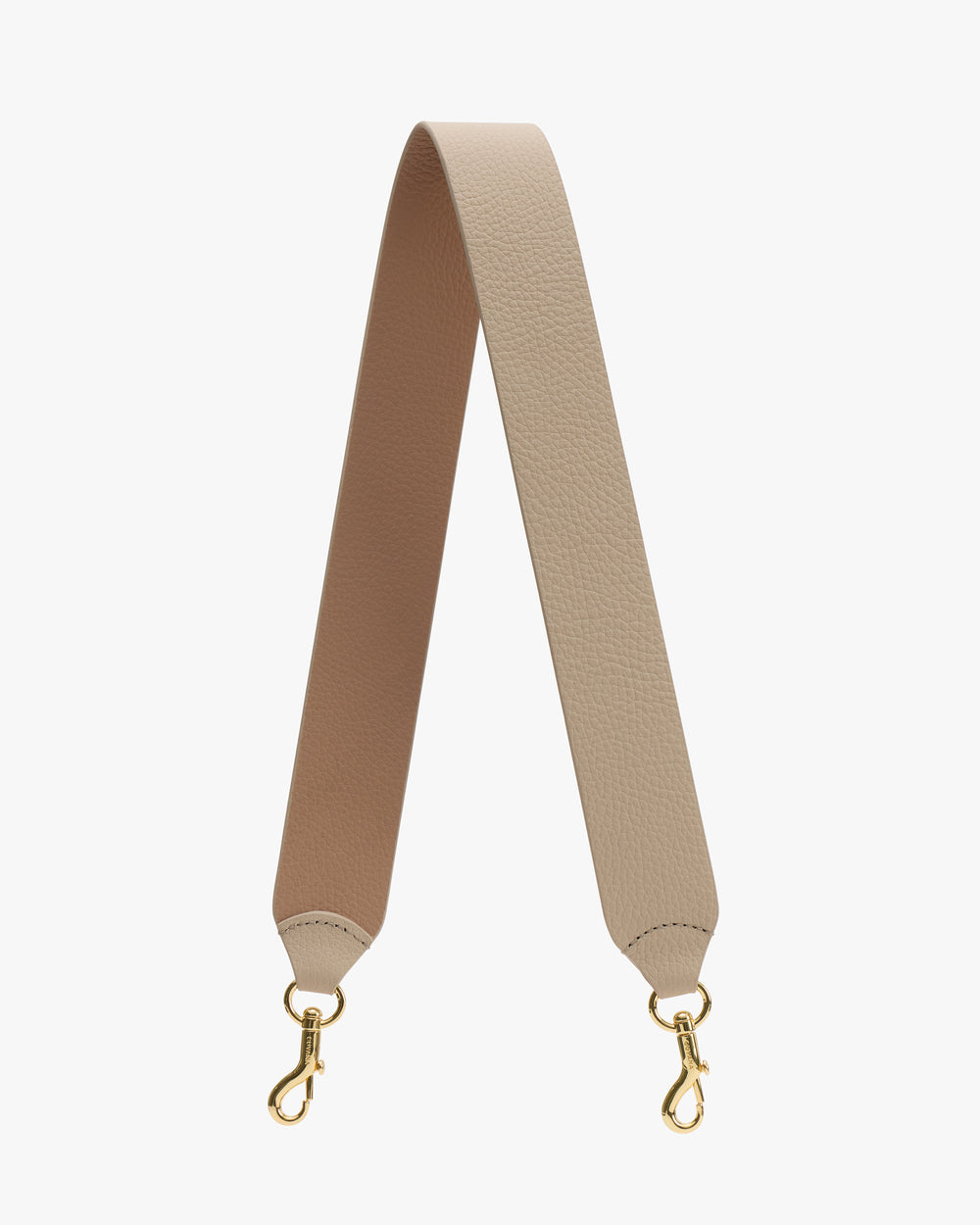 Bag strap with gold clasps on each end