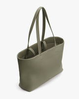 Tote bag with long handles and open top view.