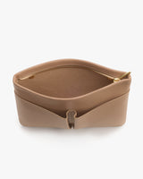 Open zippered pouch with visible inner compartment.