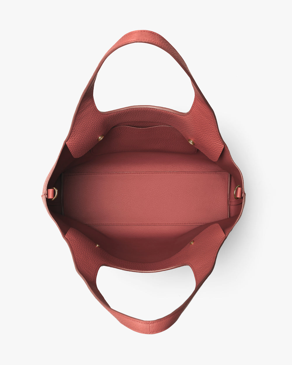 Top view of open handbag with wide handles.