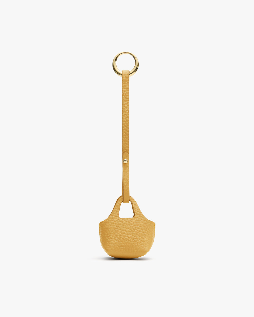 Small textured bag with a handle and a round metal ring.