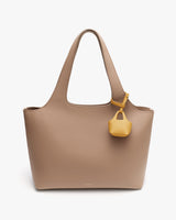 Handbag with a small matching pouch attached to the strap.