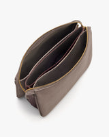 Open zippered pouch with multiple compartments.