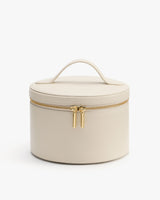 Round storage case with handle and zipper.