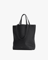 Minimal tote bag with two handles and a central compartment.