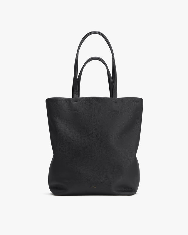 Large tote bag with two handles displayed upright.