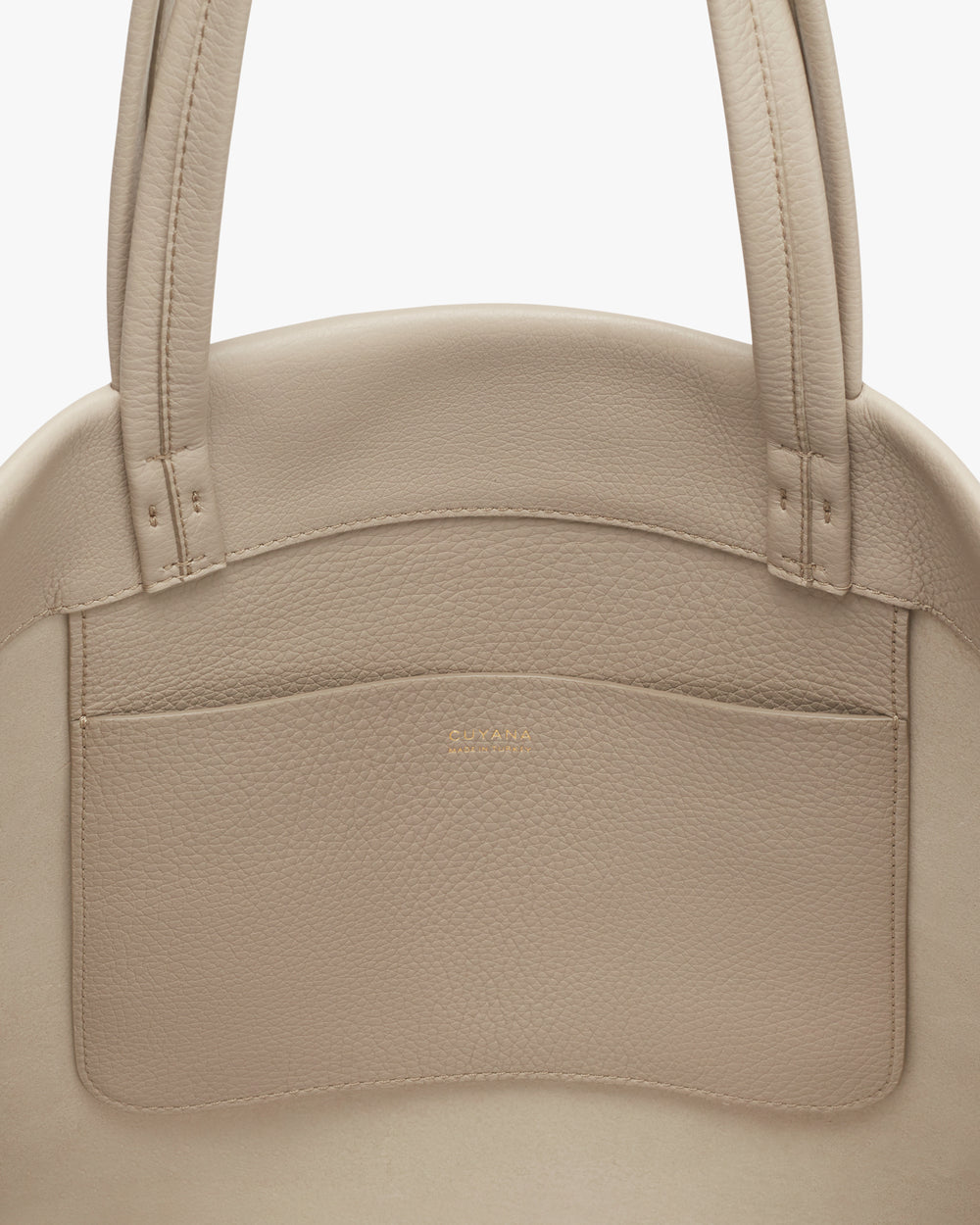 Handbag with two straps and front pocket.