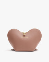 Heart-shaped textured pouch with zipper on top.
