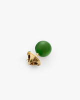 Stud earring with a round stone and a gold spiked backing.