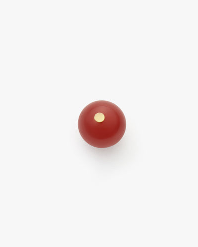 Small round knob with a dot on top