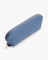 Long zippered pouch with a curved top and textured surface.