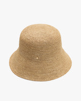Woven bucket hat on a plain background