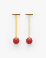 Two dangling T-bar earrings with round beads.