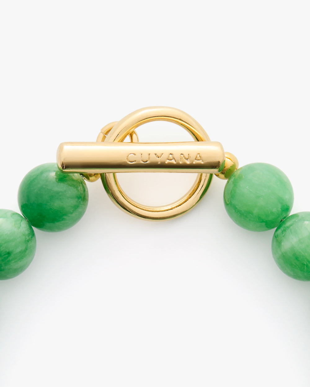 Beaded bracelet with a round toggle clasp.
