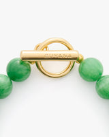 Beaded bracelet with a round toggle clasp.