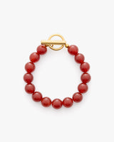 Beaded bracelet with round beads and a toggle clasp.
