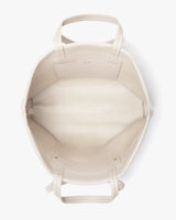 Open top view of empty travel bag with interior compartments.