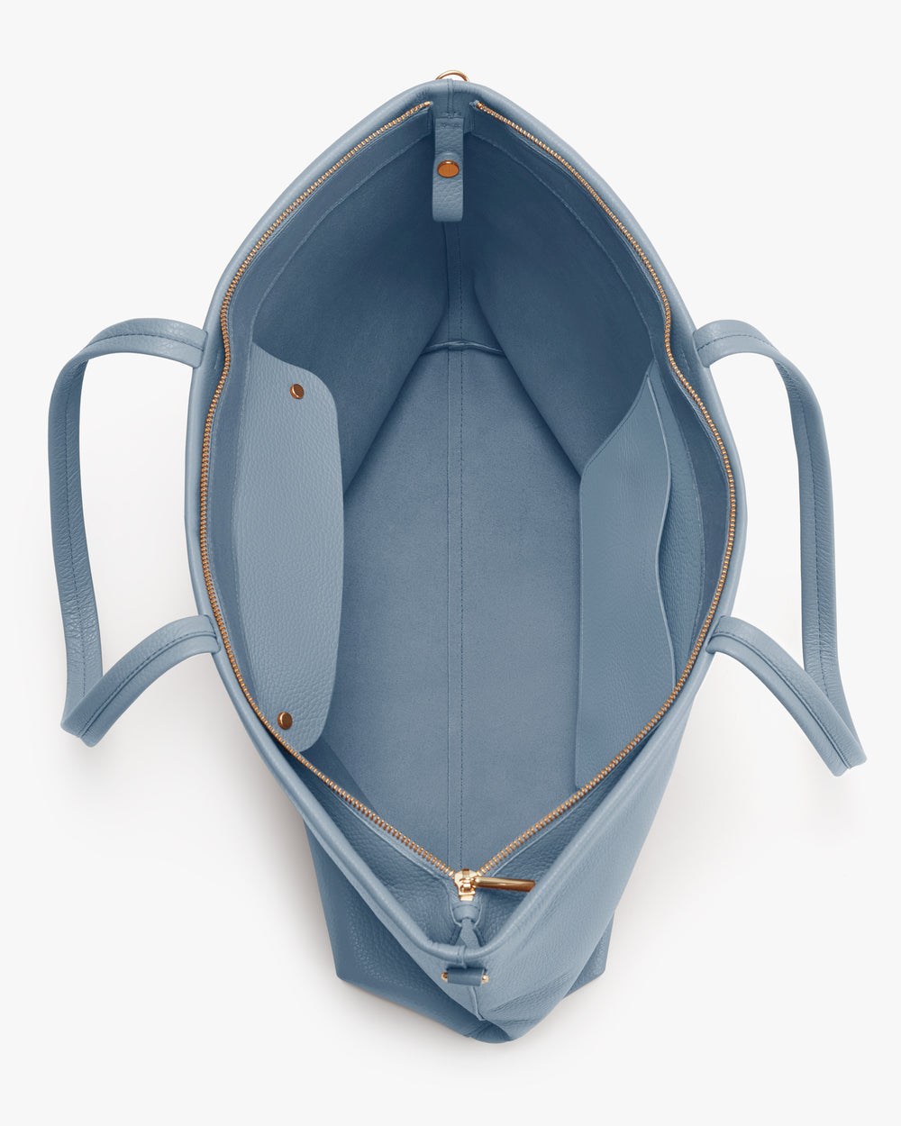 Open tote bag with zipper and interior pocket.