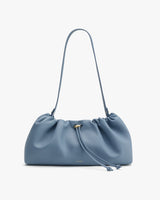 Shoulder bag with a ruched design and long strap