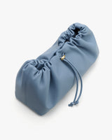 Drawstring pouch with gathered fabric.