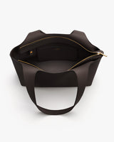Open tote bag with an inner pocket and zipper, viewed from above.