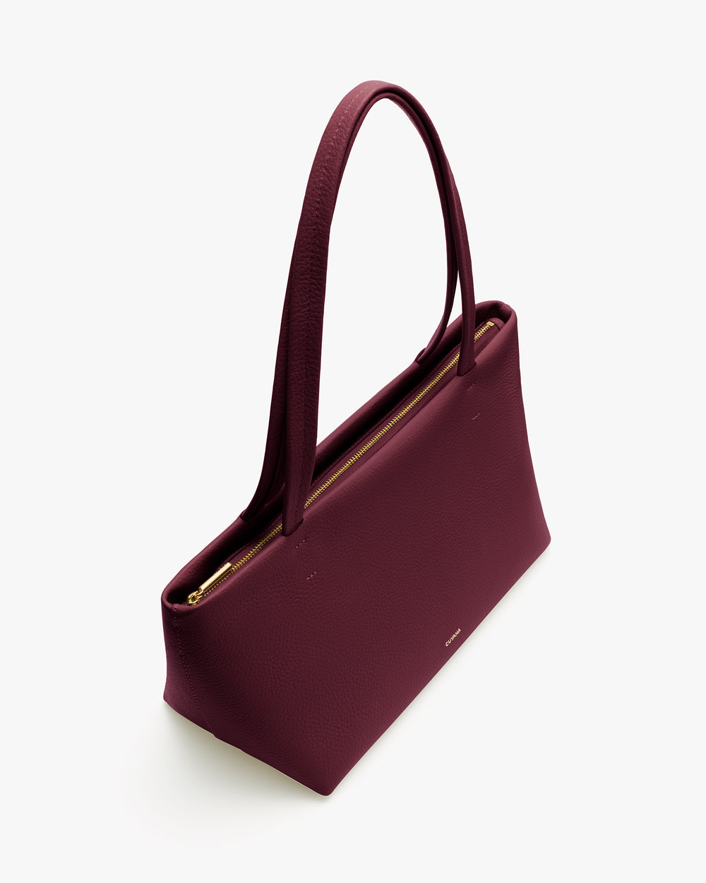 Rectangular handbag with long handles and a zipper on top.
