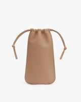 Drawstring pouch with two tied straps on each side.