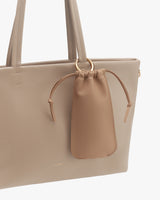 Tote bag with a small pouch attached by a ring.