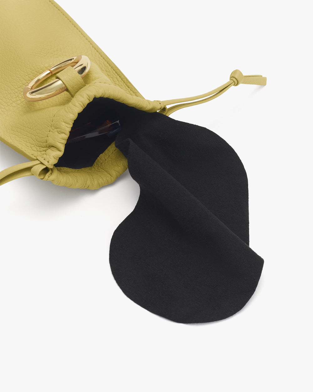 Drawstring pouch opening with a gold buckle visible.