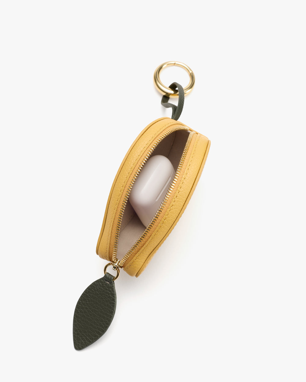Small zippered pouch with a leaf keychain holding an item inside.