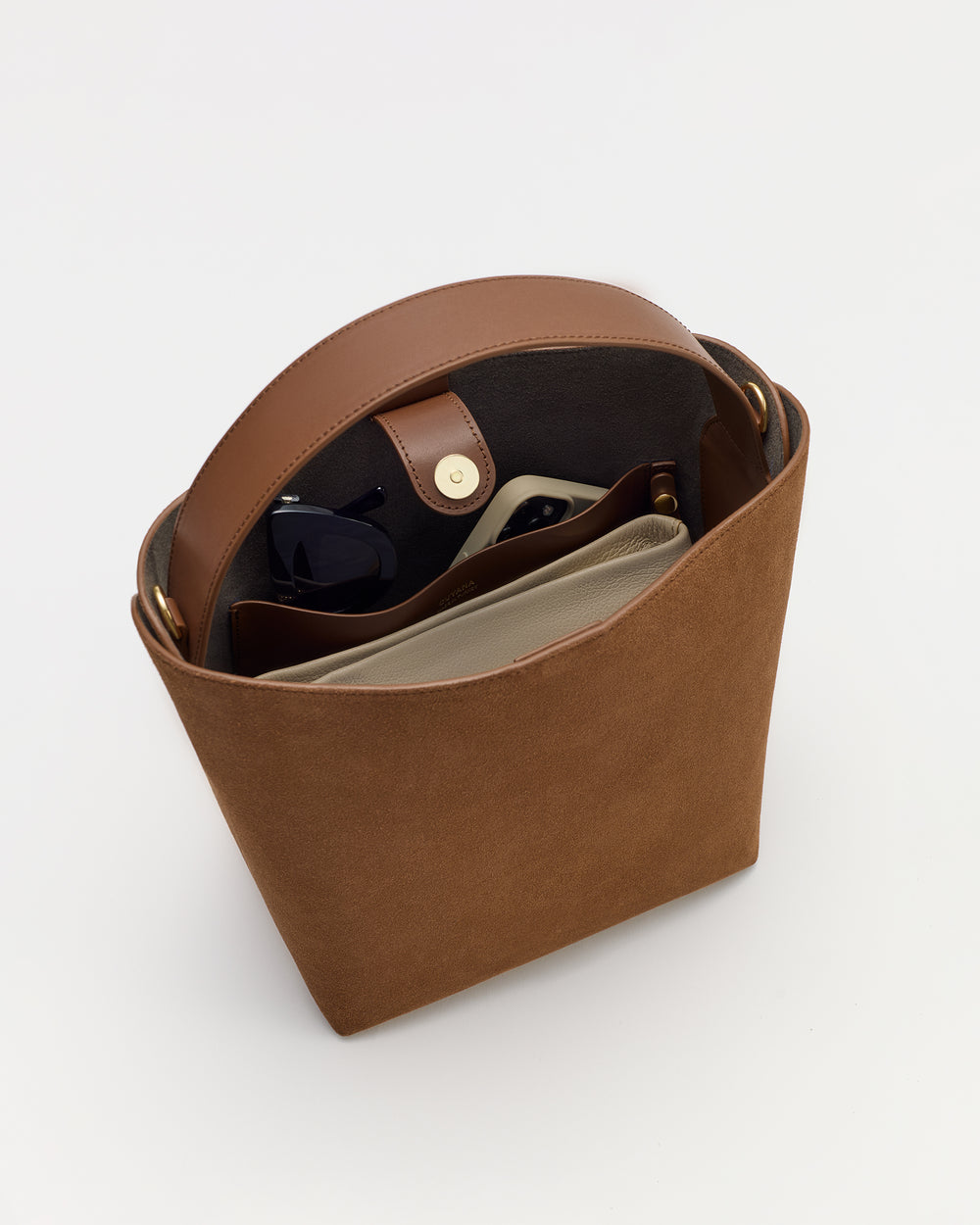 Open handbag with sunglasses and a wallet inside.