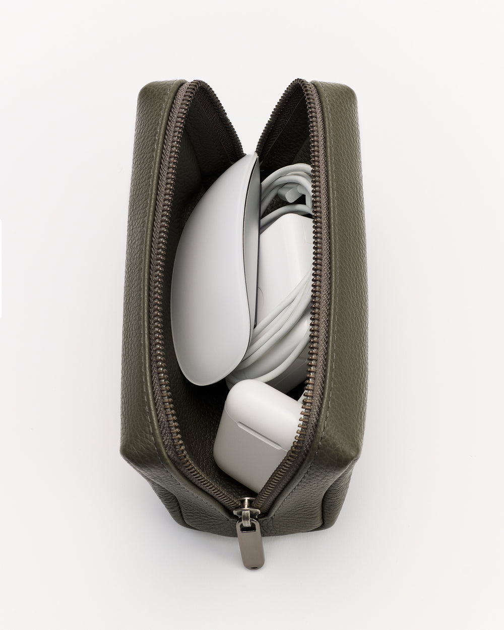 Rectangular pouch holding computer mouse and charging adapter.