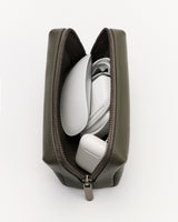 Rectangular pouch holding computer mouse and charging adapter.
