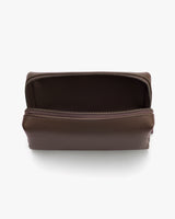 Open toiletry bag with zipper, showing interior.