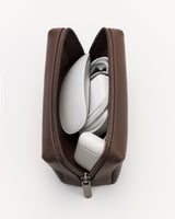 Open zip pouch holding mouse, charger, and cable.