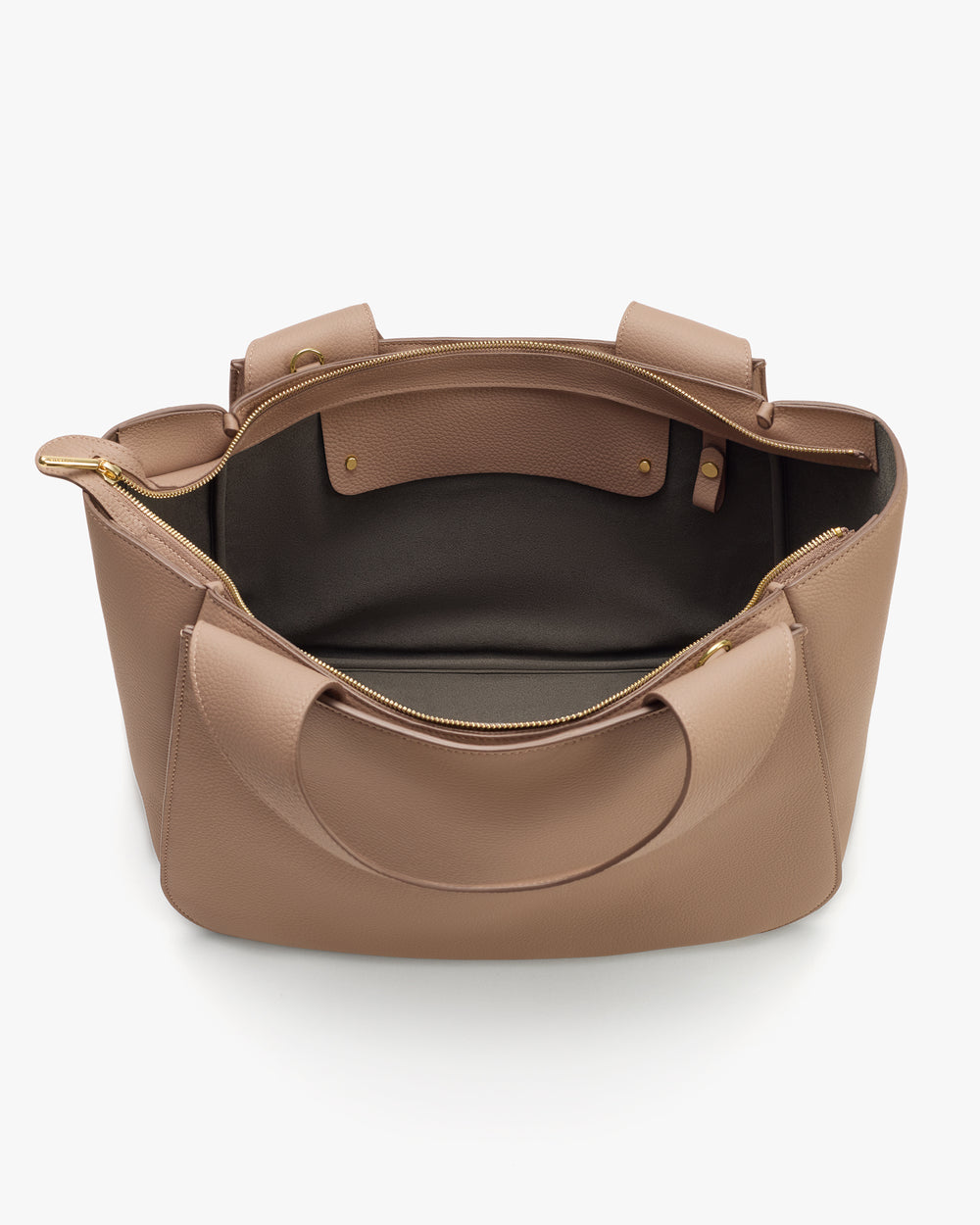 Open travel bag showing inner compartment and handles.