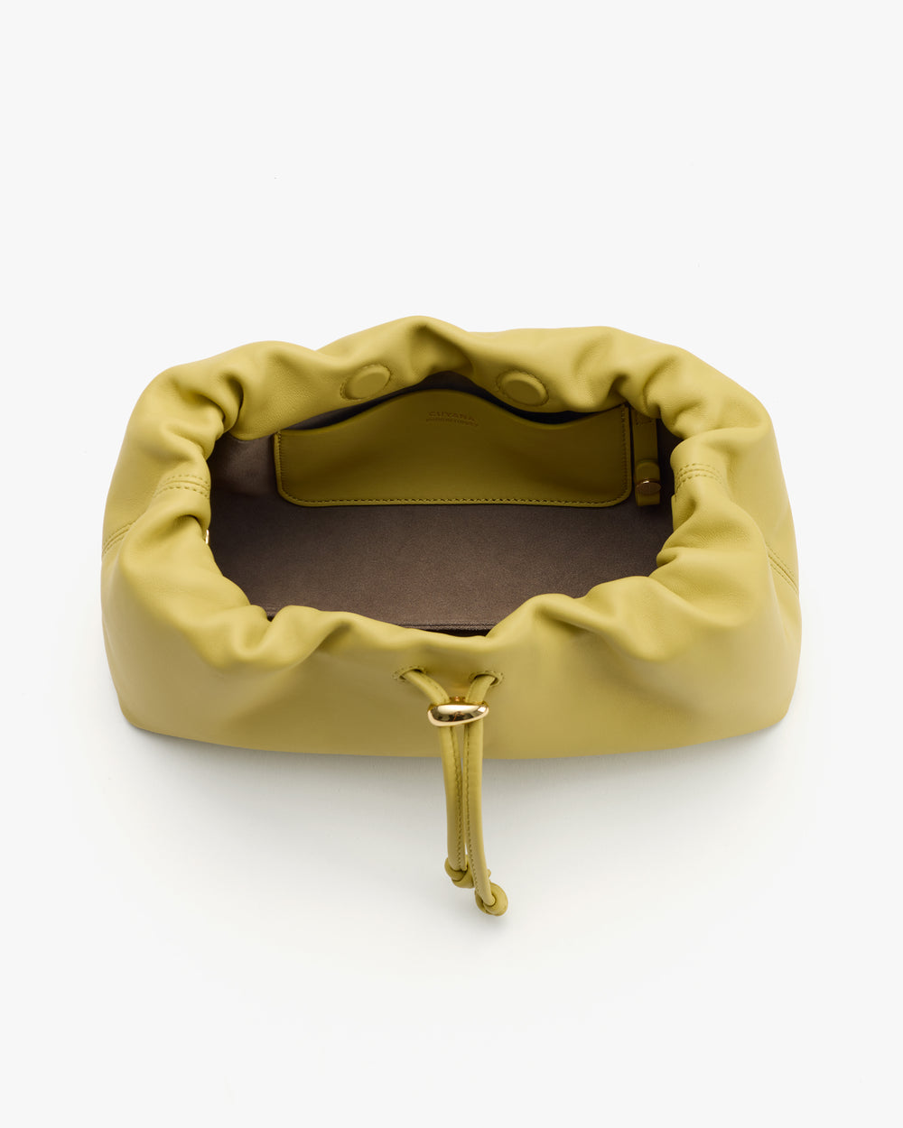 Soft clutch bag with open drawstring and interior pocket.