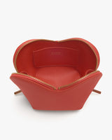 Open, dome-shaped pouch with visible zippered edges and a small interior pocket.