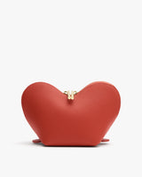 Heart-shaped pouch with zip closure on top.
