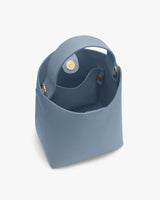 Bucket bag with open top and single handle.