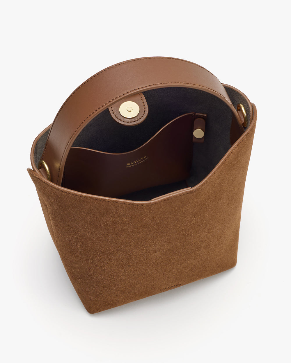 Open bucket bag with round handle and magnetic clasp.