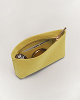Small open zippered pouch with items inside.