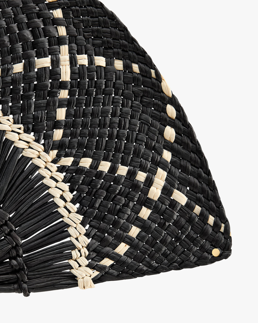 Half-circle woven straw bag with intricate pattern.