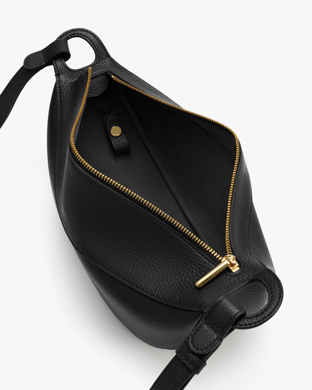 Open belt bag with a zip closure and a small interior pocket.