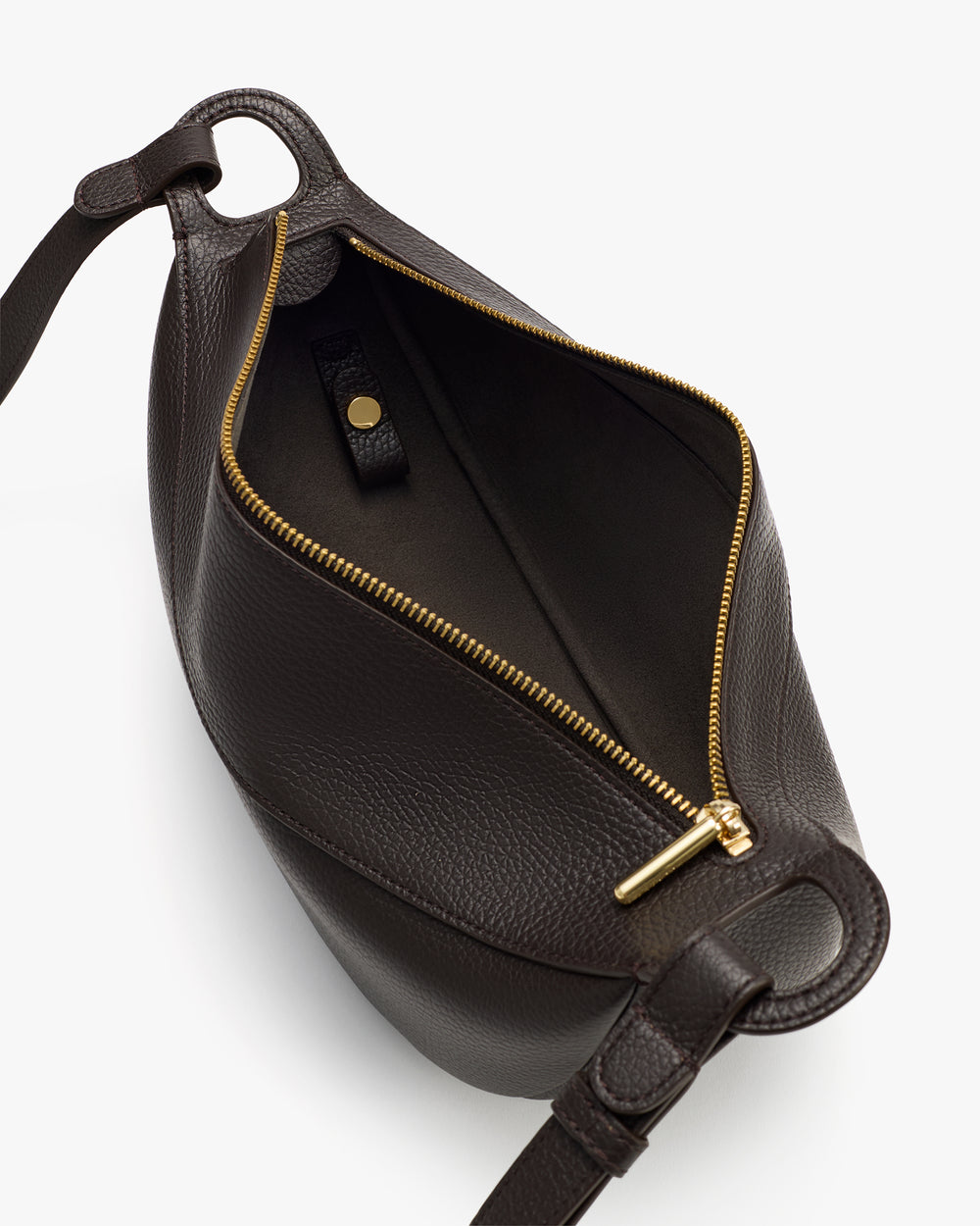 Open handbag with visible zipper and interior pocket.