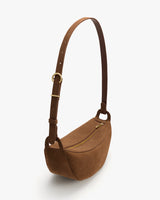 Belt bag with adjustable strap and zipper closure.
