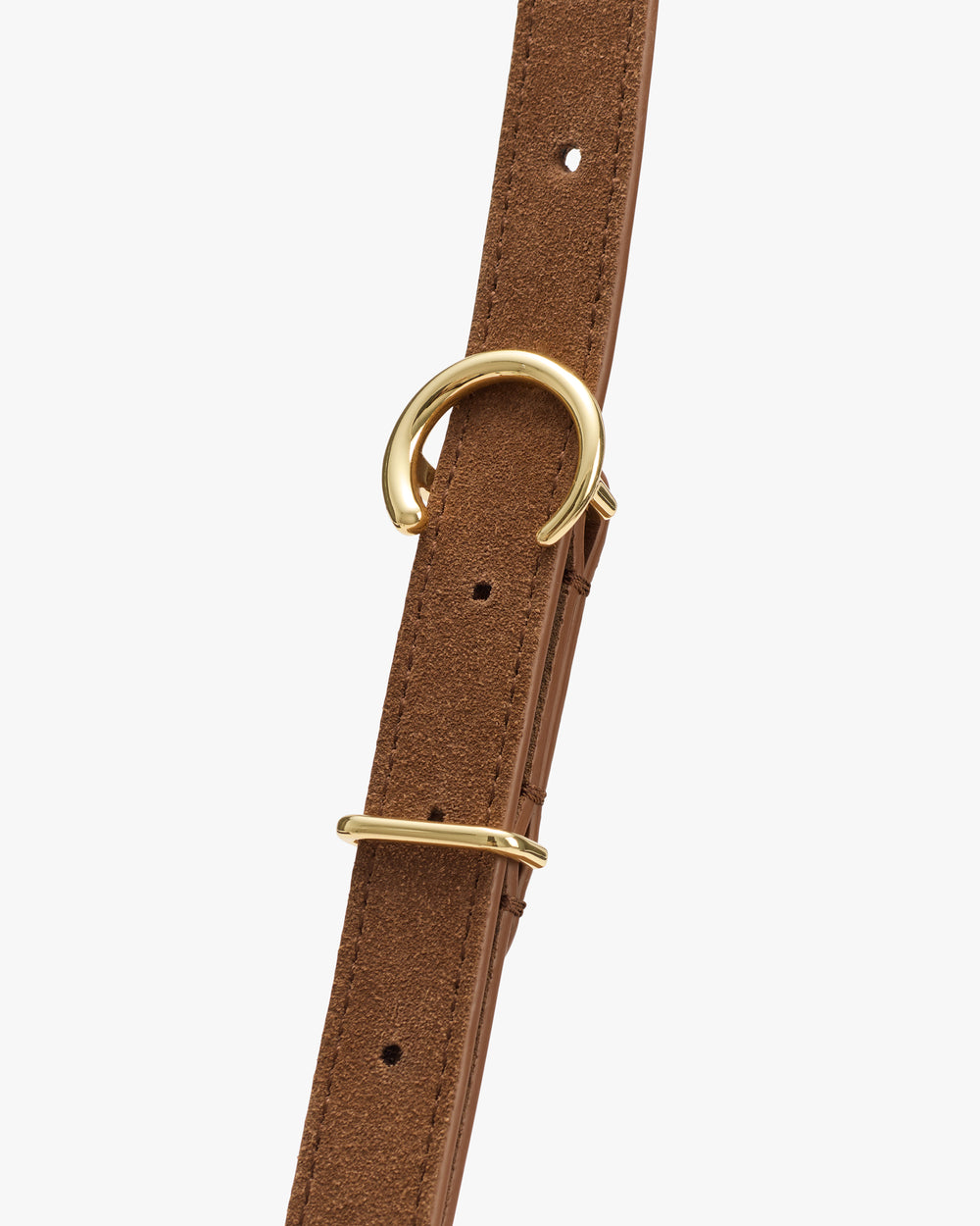 Close-up of a belt with a metal buckle and loop.