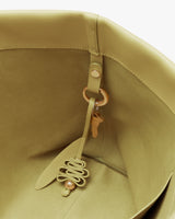 Interior pocket of a bag with key ring attached.