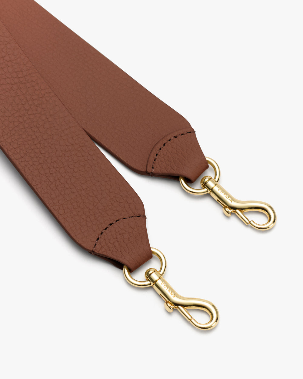 Two leather bag straps with metal clasps.